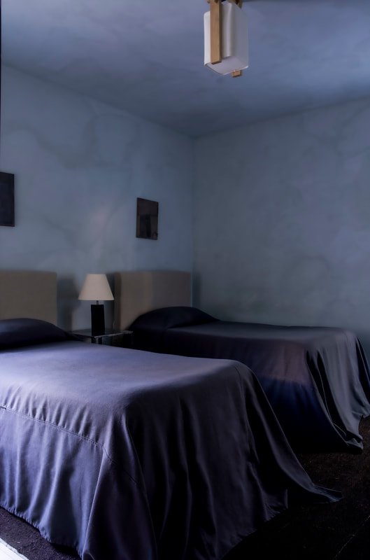 King or twin configuration in the Two Bedroom Corner Suite.