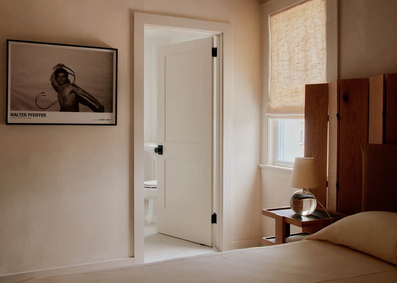 Linen-draped windows and Queen bed at Jersey Shore boutique hotel.